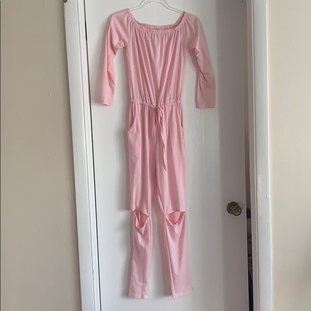 Cozy pink one piece PJs.